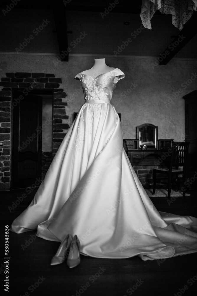 bride's dress on a mannequin without a head
