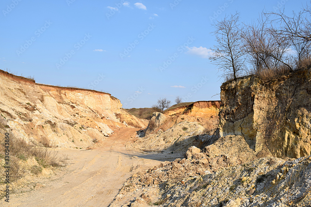 Sand quarry and road in the middle of a quarry.