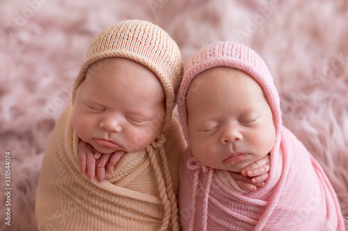 newborn twin girls. first photo session of newborns