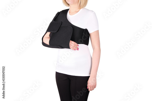 Shoulder Joint Brace. Bandage on the shoulder joint (scarf) with additional fixation. Deso's Handwrap. Supports & Immobilizers. Orthopedic medical Braces. Shoulder injury. photo