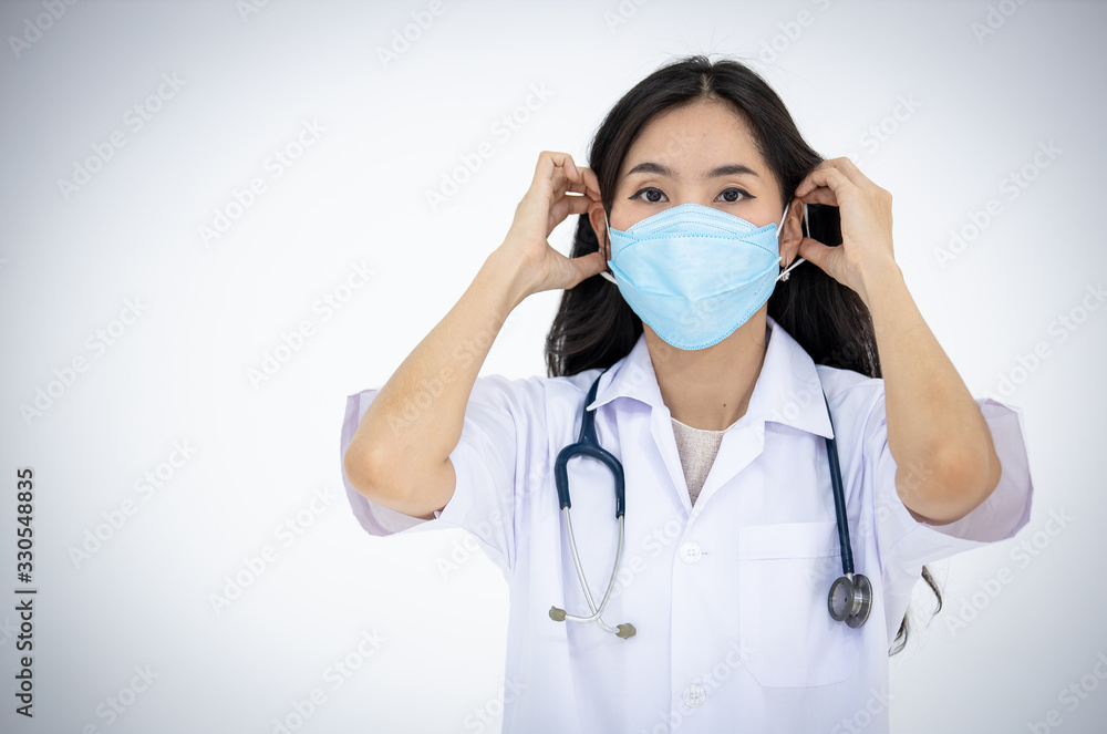 The female doctor taught how to wear a mask correctly to prevent covid-19 , bacteria, corona , sars , influenza virusand . Pm2.8