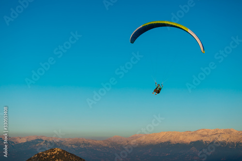 Paragliding. Feeling of freedom. Beautiful view. Extreme sport.