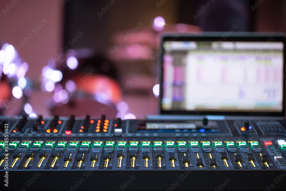Digital mixer in a recording Studio , with a computer for recording music. The concept of creativity and show business. - obrazy, fototapety, plakaty 