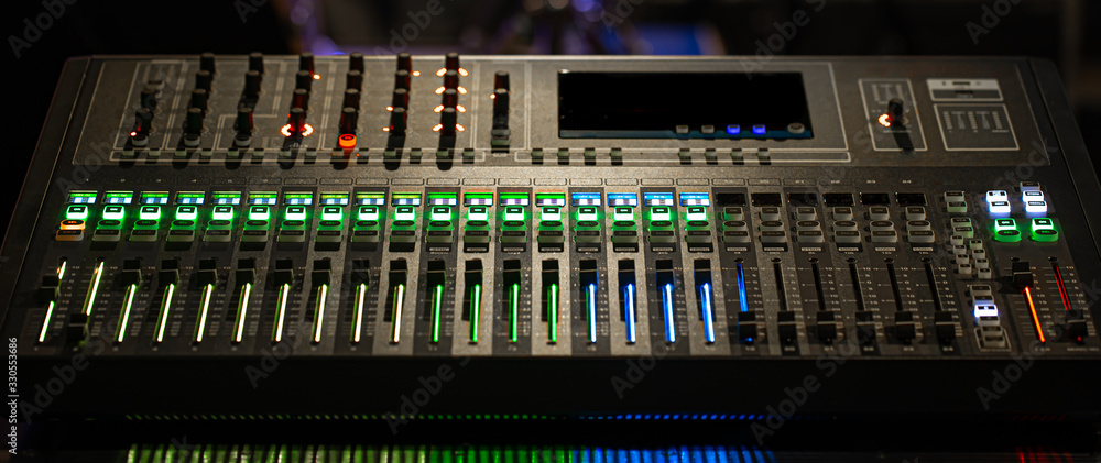 Digital mixer in a recording Studio. Work with sound. The concept of creativity and show business.