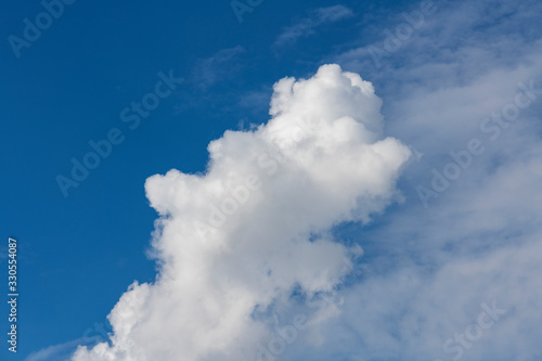 Beautiful blue sky and close-up white clouds. Nature background .