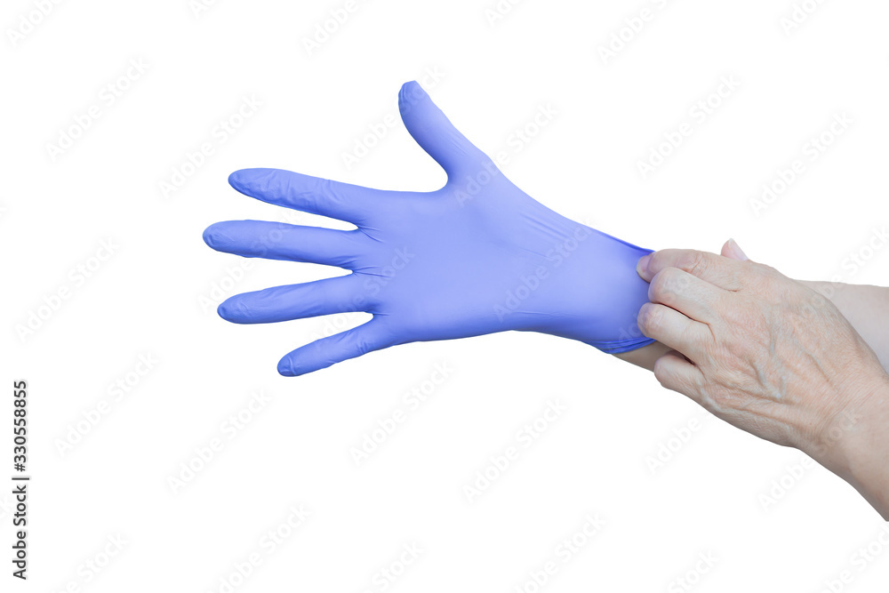 Hands wearing a blue latex glove on white background