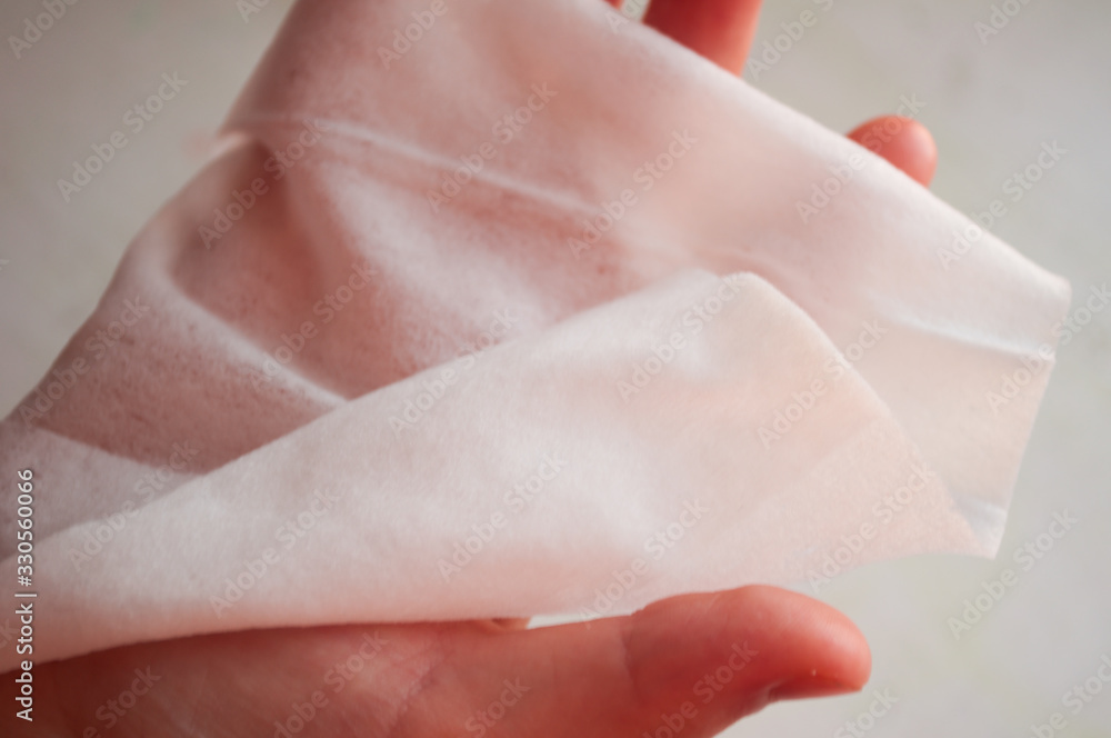 hands wipe their hands with a damp cloth. Hand hygiene, protection against viruses and germs. World Health Day.
hands wipe their hands with a damp cloth. Hand hygiene, protection against viruses and germs. World Health Day.