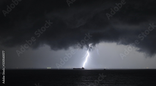 Thunderstorm at sea Singapore dangerous lightning