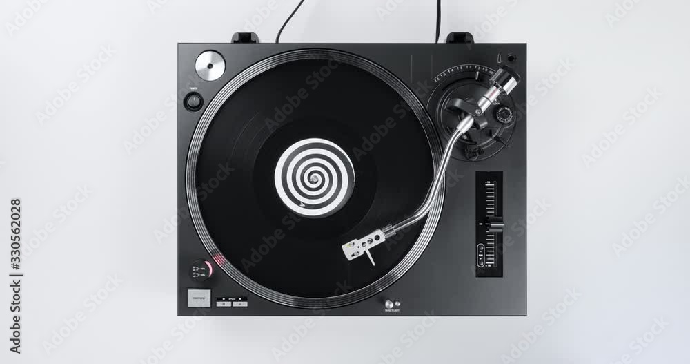 Rotating black vinyl record turntable top view musical DJ record player on stylus needle white wooden background. Loop. Macro Top view. Popular styles of disco from 90s, 70s, 80s. Party Rotating black vinyl record turntable top view musical DJ record player on stylus needle white wooden background. Loop. Macro Top view. Popular styles of disco from 90s, 70s, 80s. Party