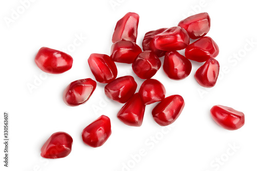 Heap of fresh pomegranate seeds isolated on white background with clipping path and full depth of field. Top view. Flat lay.