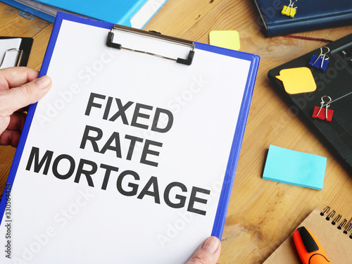 Conceptual photo showing printed text fixed rate mortgage photo