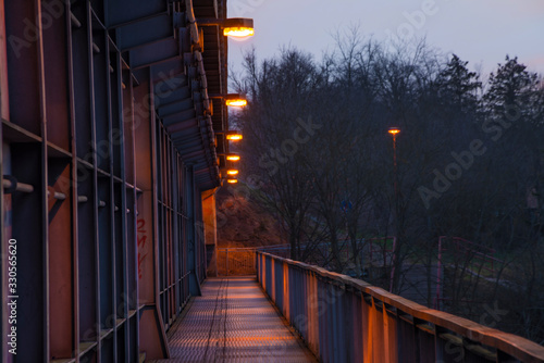 Sunset evening on foot and railway bridge over valley in Trebic town