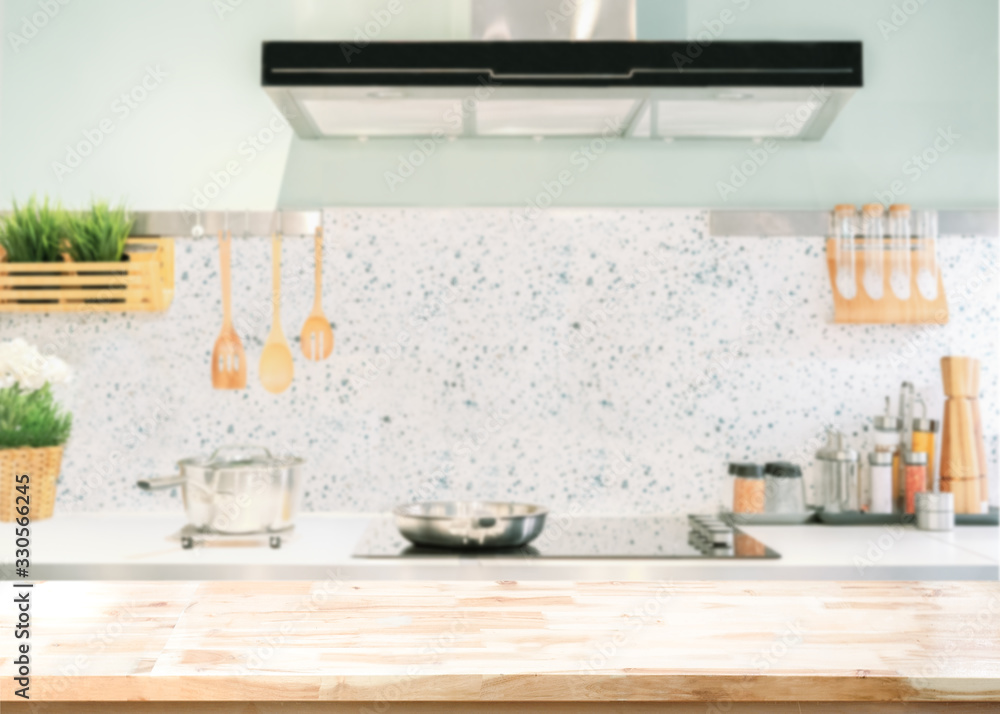 Wood table top on blurred kitchen background Stock Photo | Adobe Stock