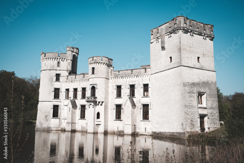 Flanders Belgium: Bouchout Castle in Meise on a clear fine day with blue sky photo