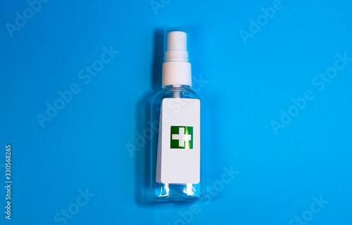 Pharmacy for disinfection of hands and surfaces on a blue background with copy space. Infection protection. Coronavirus