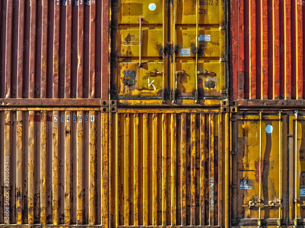 Obraz premium stack of multicoloured shipping containers