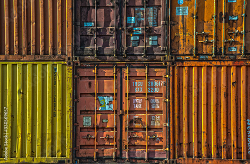 stack of multicoloured shipping containers