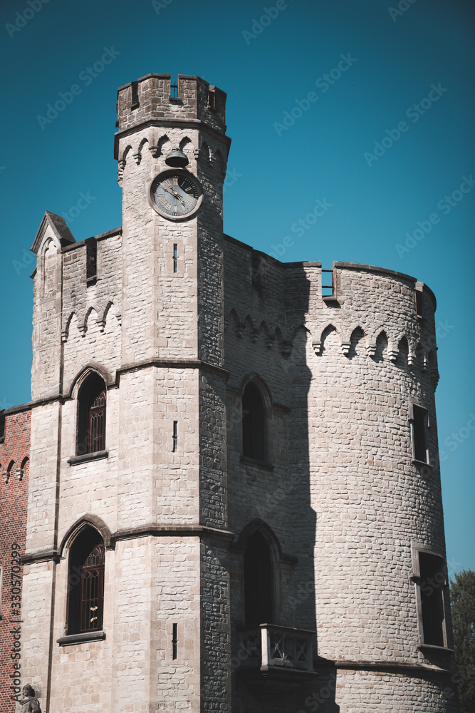 Flanders Belgium: Bouchout Castle in Meise on a clear fine day with blue sky