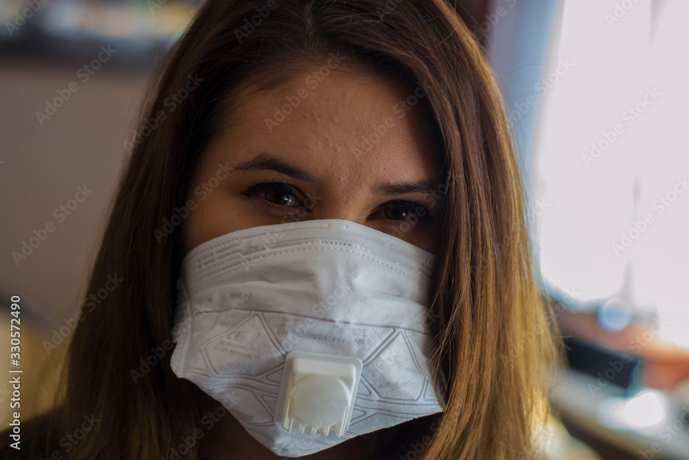 A woman in a mask during quarantine