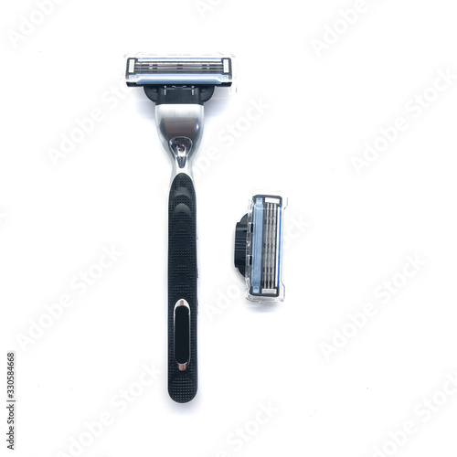 Razor isolated on a white background. Men's razor. Shave. Body care. Black razor.