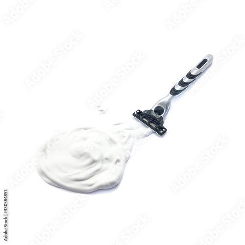 Shaving foam and razor isolated on a white background. Set of razor and shaving foam. Men's hygiene. Shave. Body care. Beard Care. 