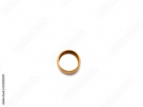 Golden ring isolated on a white background. Antique gold ring. Jewelry.