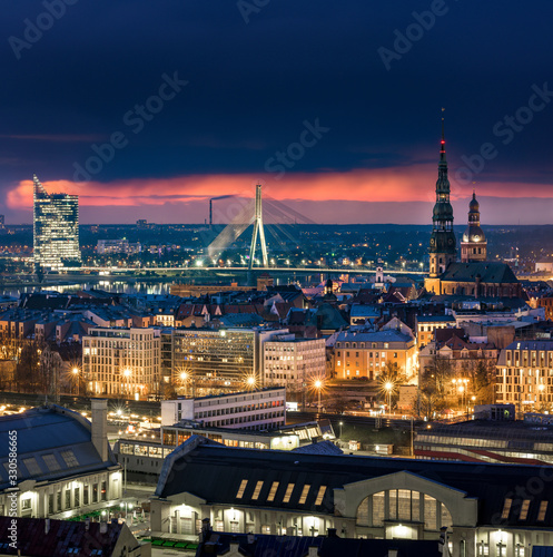 Panoramic, aerial view over Riga city. Scenic view over iconic church towers, old town and infrastructure. © Viesturs