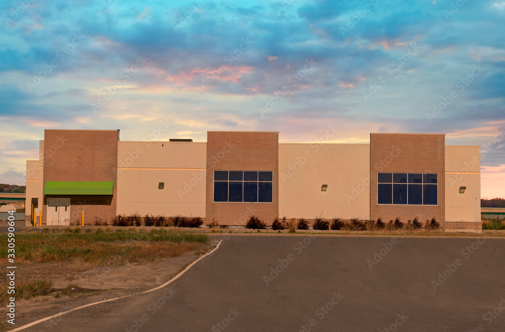 Unoccupied generic store, business or professional office space. Sunny summer day. Unoccupied generic store, business or professional office space. Sunny summer day.