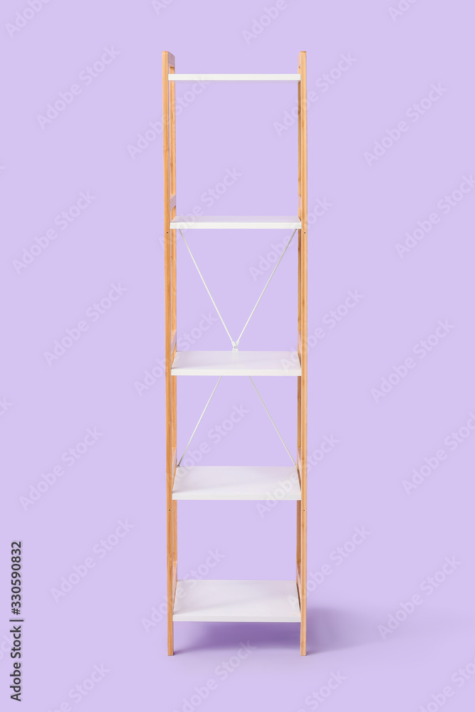 Empty shelving unit on color background Empty shelving unit on color background