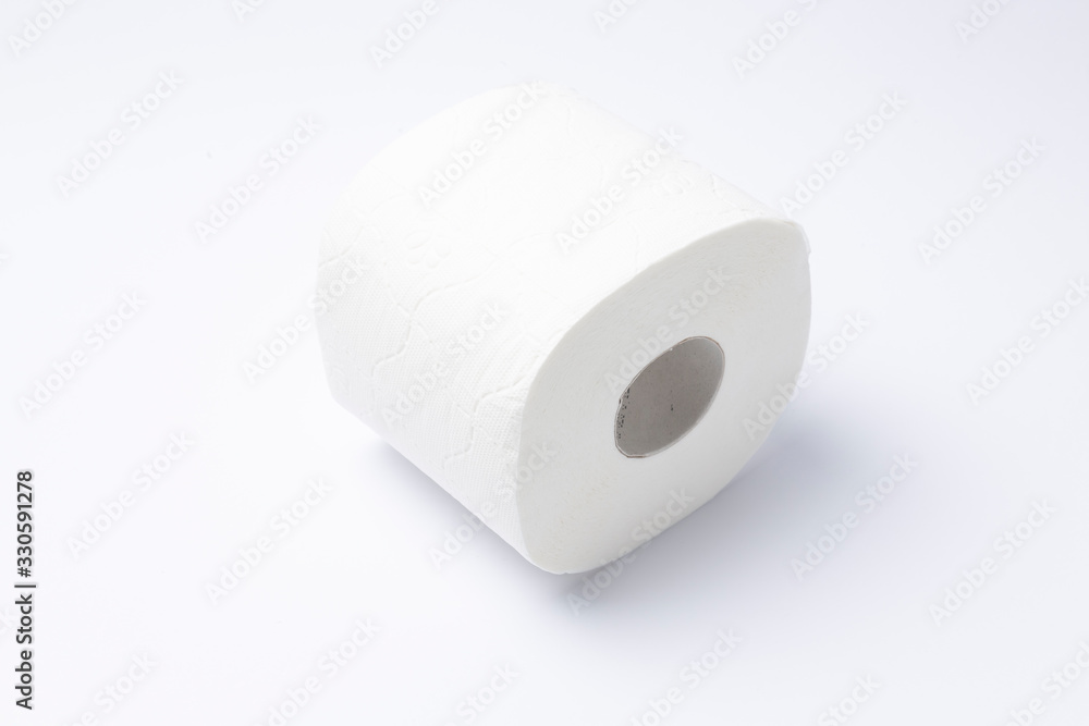 Symbol image for corona crisis panic buying / hoarding. Roll of toilet paper on white Background, with copy space. Symbol image for corona crisis panic buying / hoarding. Roll of toilet paper on white Background, with copy space.