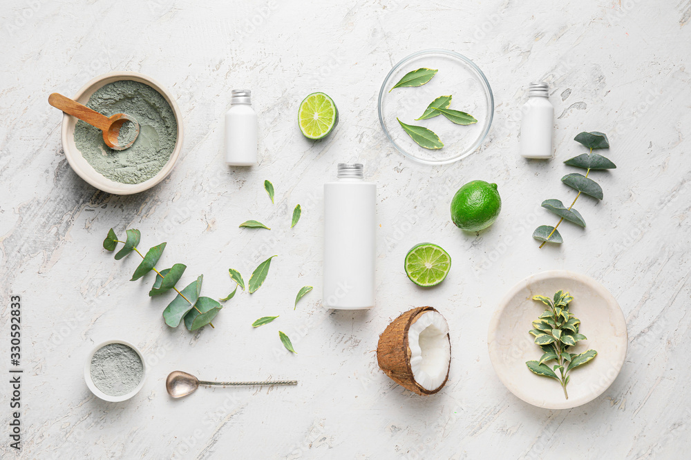 Composition with shampoo and natural ingredients on light background Composition with shampoo and natural ingredients on light background