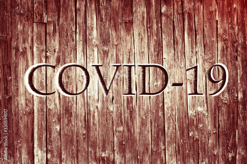 Abstract old gray wooden with covid-19 sign