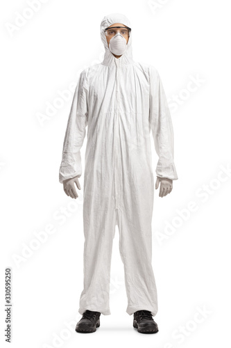 Man in a white hazmat suit and mask photo