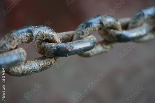 Close up of Steel chain, Rusty chains. Selective focus © Adanan