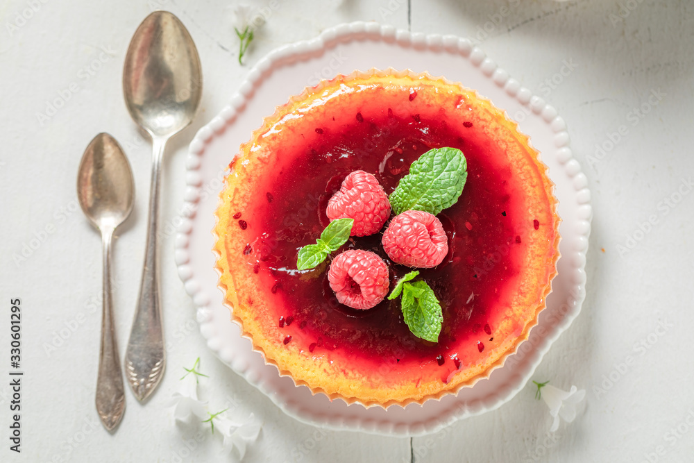 Yummy and sweet raspberry cheesecake made with fresh berries