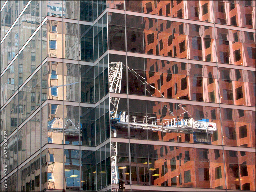 Toronto, Ontario / Canada - June 27 2008 : Reflection of the image of the crane on the window