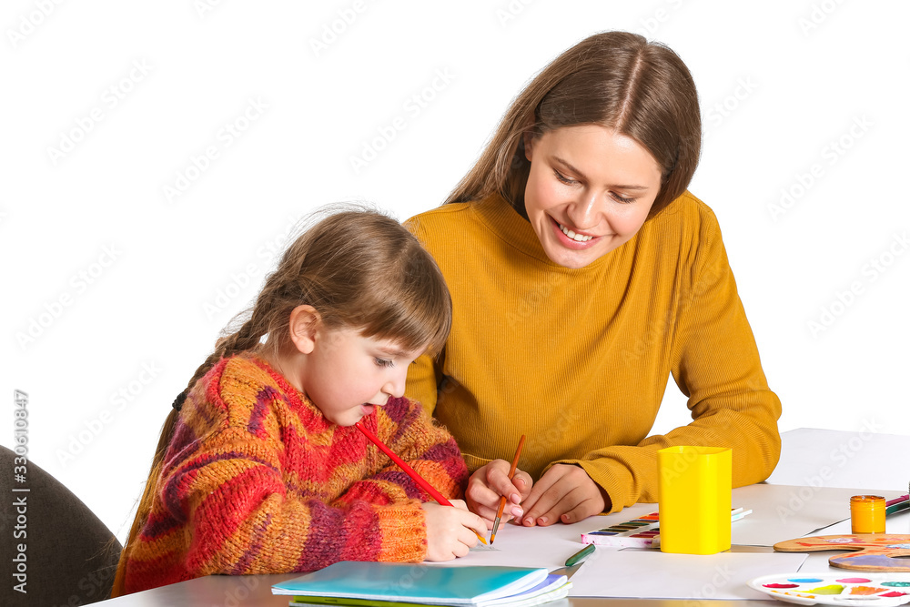 Drawing teacher giving private art lessons to little girl on white background Drawing teacher giving private art lessons to little girl on white background