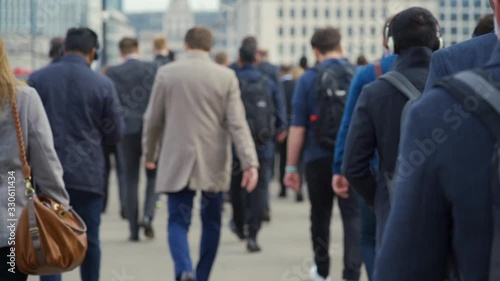 Crowd of pedestrian commuters in London on cool morning in slow motion. Clip 31
