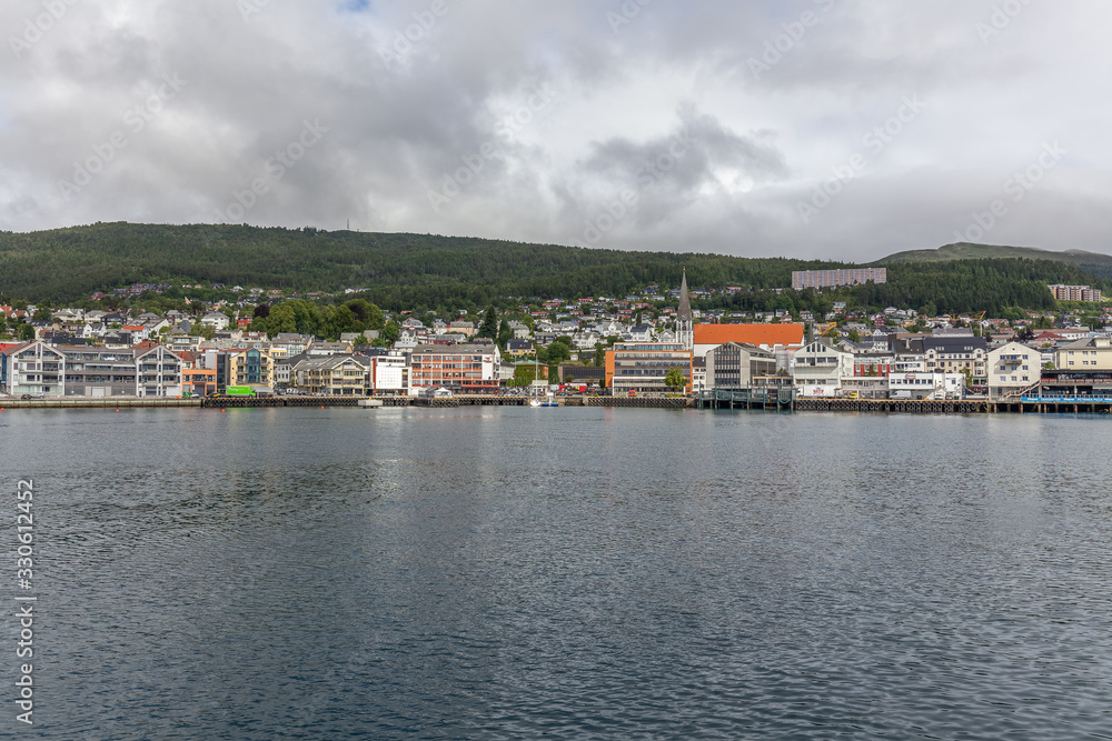Norway - June 14, 2016: view of a small town from the deck of ships, selective focus.