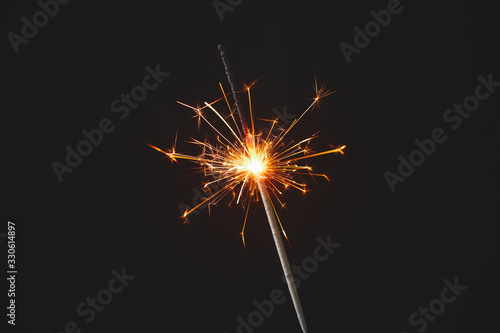 Beautiful Christmas sparkler on dark background