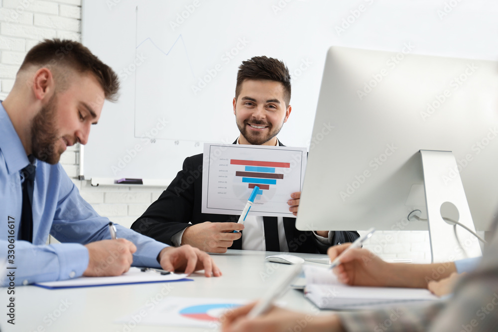 Professional business trainer working with people in office Professional business trainer working with people in office