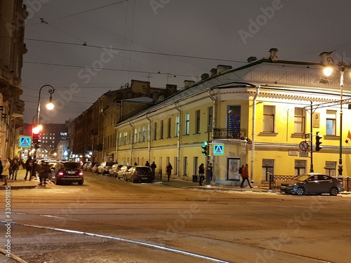 winter on street of night city photo