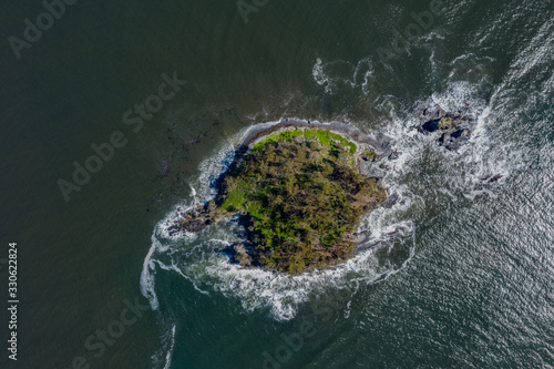 Aerial drone view above Snapper Island at Batemans Bay on the New South Wales South Coast, Australia, on a sunny day   © Steve