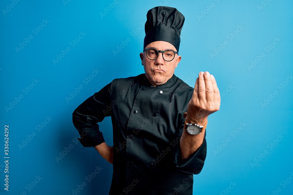 Middle age handsome grey-haired chef man wearing cooker uniform and hat Doing Italian gesture with hand and fingers confident expression Middle age handsome grey-haired chef man wearing cooker uniform and hat Doing Italian gesture with hand and fingers confident expression