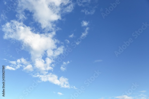 Blue sky background. Blue sky with fluffy white clouds. Copy space © kvitkanastroyu