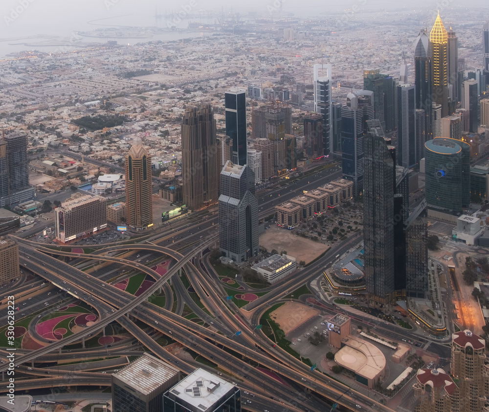 DUBAI, UAE - may 2019: Aerial view of Downtown Dubai with man made lake and skyscrapers from the tallest building in the world, Burj Khalifa, at 828m