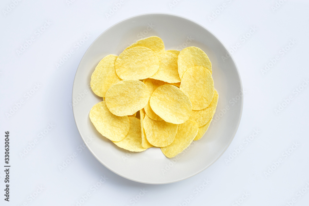 Potato chips on white background.