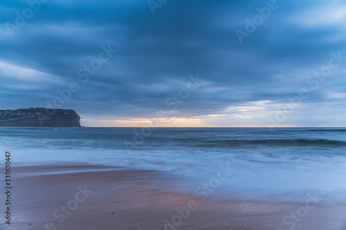 Sunrise Seascape and Rain Clouds