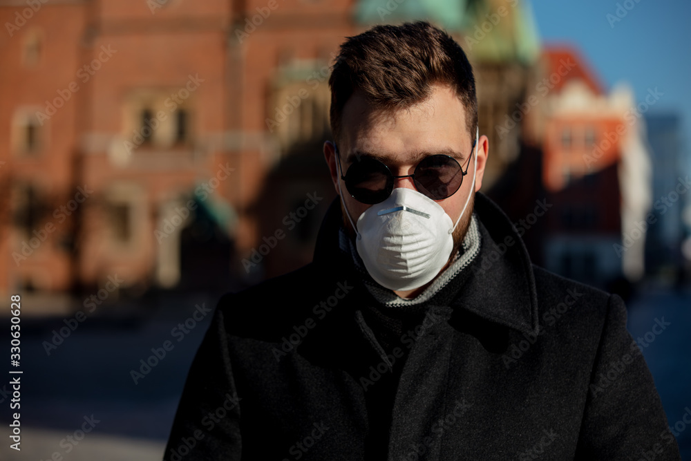 guy in sunglasses and mask on street of Wroclaw, Poland guy in sunglasses and mask on street of Wroclaw, Poland