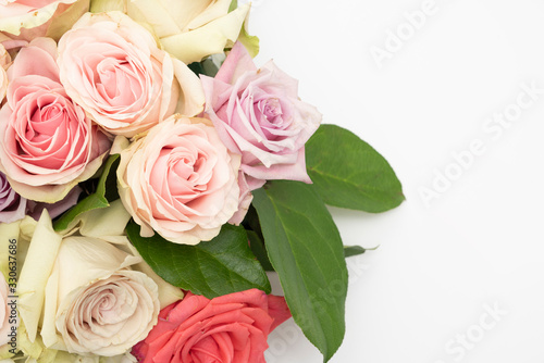beautiful fresh rose floral flat lay floral background © IlzeLuceroPhoto